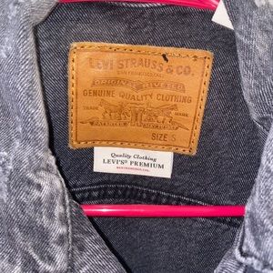 Faded black Levi’s jean jacket